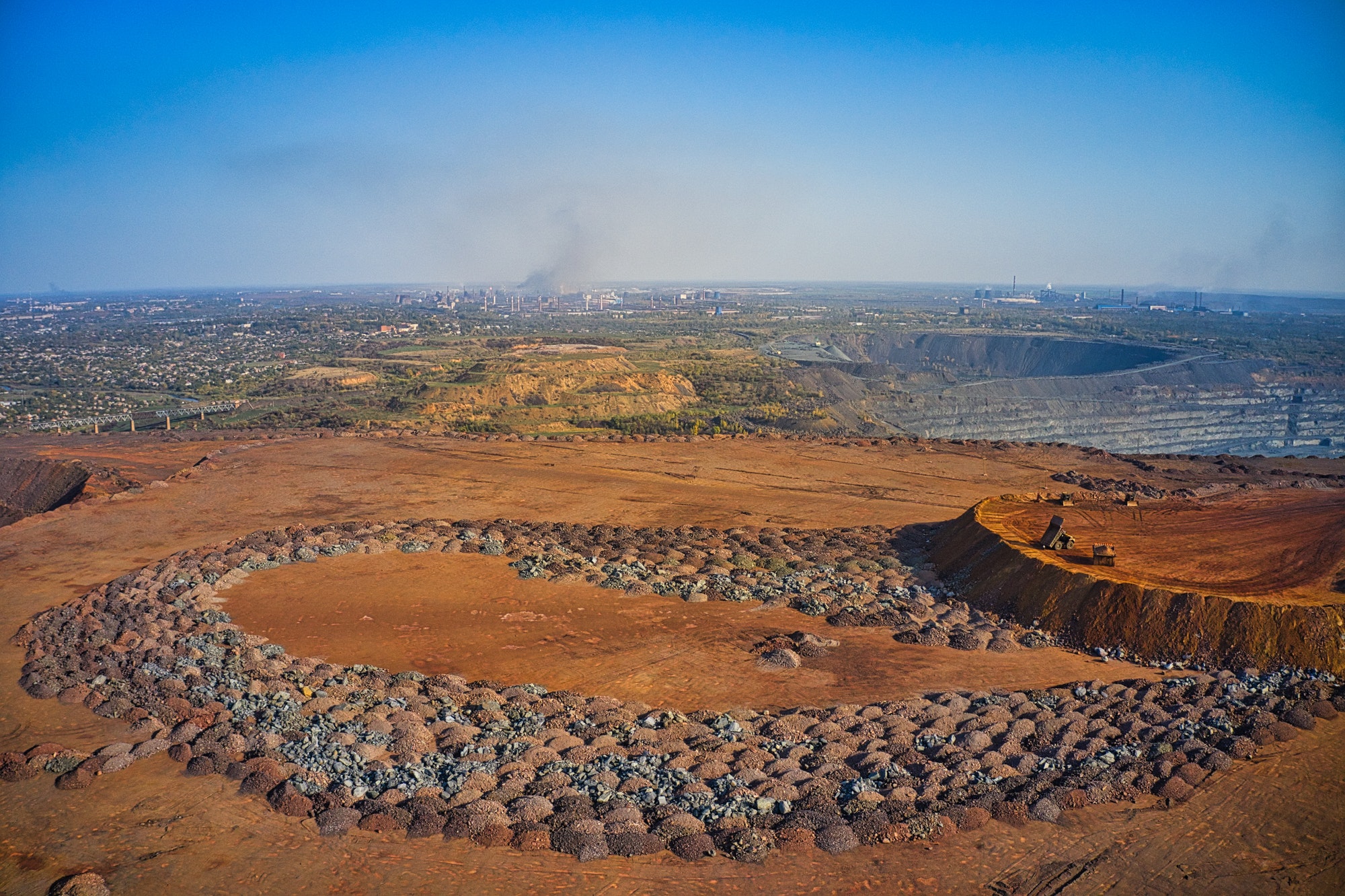 Huge mounds of waste iron ore near the quarry